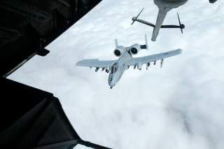 A US Air Force A-10 Thunderbolt-2 makes its way to a fueling boom suspended from a US Air Force KC-10 Extender during mid-air refueling support to Operation Inherent Resolve over Iraq and Syria air space, March 15, 2017. REUTERS/Hamad I Mohammed
