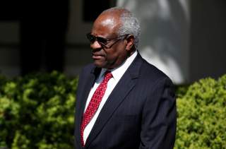 Associate Supreme Court Justice Clarence Thomas arrives for the swearing in ceremony of Judge Neil Gorsuch as an Associate Supreme Court Justice in the Rose Garden of the White House in Washington, U.S., April 10, 2017. REUTERS/Joshua Roberts