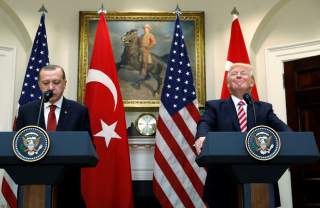 Turkey's President Recep Tayyip Erdogan (L) and U.S President Donald Trump deliver statements to reporters in the Roosevelt Room of the White House in Washington, U.S. May 16, 2017. REUTERS/Kevin Lamarque TPX IMAGES OF THE DAY