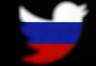 A 3D-printed Twitter logo displayed in front of Russian flag is seen in this illustration picture, October 27, 2017. REUTERS/Dado Ruvic/Illustration