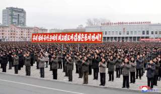 People rally to hail the completion of the state nuclear force, the cause of building a rocket power under the guidance of the Workers' Party of Korea, in this in this undated photo released by North Korea's Korean Central News Agency (KCNA) on December 6