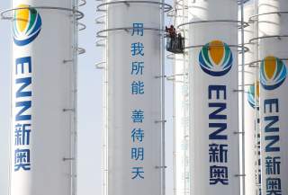 A liquified natural gas (LNG) storage facility of the ENN Group Co is under construction in Baoding, Hebei province, China, December 5, 2017. REUTERS/Thomas Peter