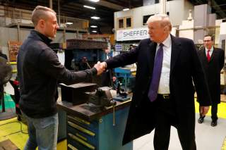 U.S. President Donald Trump meets workers as he takes a factory tour of the Sheffer Corporation in Blue Ash, Ohio, U.S. February 5, 2018. REUTERS/Jonathan Ernst