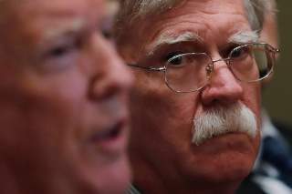 U.S. President Donald Trump receives a briefing from senior military leadership accompanied by his new National Security Adviser John Bolton at the Cabinet Room of the White House in Washington, DC, U.S. 