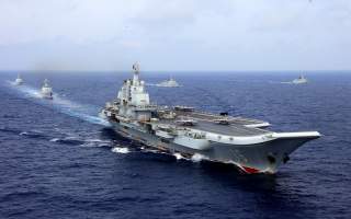 China's aircraft carrier Liaoning takes part in a military drill of Chinese People's Liberation Army (PLA) Navy in the western Pacific Ocean, April 18, 2018. Picture taken April 18, 2018. REUTERS/Stringer