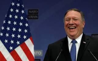 U.S. Secretary of State Mike Pompeo smiles as he attends a news conference after a NATO foreign ministers meeting at the Alliance’s headquarters, in Brussels, Belgium April 27, 2018. REUTERS/Yves Herman