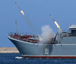 A Russian warship fires missiles during the Navy Day parade in the Black Sea port of Sevastopol, Crimea, July 29, 2018. REUTERS/Pavel Rebrov