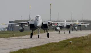 U.S. Air Force F-15 fighter jets are seen on the tarmac during the Clear Sky 2018 multinational military drills at Starokostiantyniv Air Base in Khmelnytskyi Region, Ukraine October 12, 2018. REUTERS/Gleb Garanich