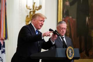 U.S. President Donald Trump delivers remarks alongside Defense Secretary James Mattis at a reception commemorating the 35th anniversary of the attack on the Beirut Barracks in the East Room of the White House, in Washington, U.S., October 25, 2018. REUTER