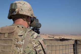 A U.S. Soldier surveils the area during a combined joint patrol in Manbij, Syria, November 1, 2018. Picture taken on November 1, 2018. Courtesy Zoe Garbarino/U.S. Army/Handout via REUTERS ATTENTION EDITORS - THIS IMAGE HAS BEEN SUPPLIED BY A THIRD PARTY.