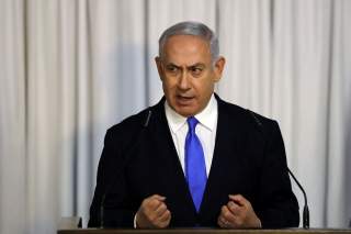 Israeli Prime Minister Benjamin Netanyahu gives a statement to the media in Tel Aviv, Israel February 21, 2019 REUTERS/ Ammar Awad