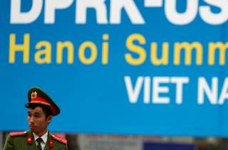 A Vietnamese police officer stands guard at the North Korea-USA summit's media centre in Hanoi, Vietnam, February 23, 2019 REUTERS/Athit Perawongmetha