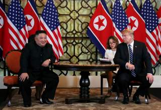 U.S. President Donald Trump looks towards North Korean leader Kim Jong Un during the one-on-one bilateral meeting at the second North Korea-U.S. summit in Hanoi, Vietnam February 28, 2019. REUTERS/Leah Millis TPX IMAGES OF THE DAY