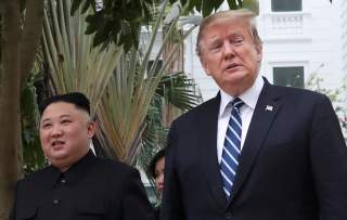 U.S. President Donald Trump and North Korea's leader Kim Jong Un walk in the garden at the Metropole hotel during the second North Korea-U.S. summit in Hanoi, Vietnam February 28, 2019. REUTERS/Leah Millis