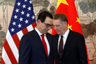 U.S. Treasury Secretary Steven Mnuchin and his Trade Representative Robert Lighthizer arrive for a group photo session after their meeting with Chinese Vice Premier Liu He, at the Diaoyutai State Guesthouse in Beijing, China, May 1, 2019. Andy Wong/Pool v