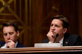 Sen. Ben Sasse (R-NE), at right, and Sen. Josh Hawley (R-M0), look on as U.S. Attorney General William Barr testifies before a Senate Judiciary Committee hearing entitled 