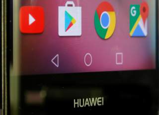 Google applications are seen on a Huawei smartphone in this illustration taken, May 20, 2019. REUTERS/Dado Ruvic/Illustration