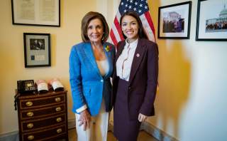 U.S. Speaker of the House Nancy Pelosi (D-CA) poses with Rep. Alexandria Ocasio-Cortez (D-NY) in a photo released by her office after they met in the Speaker's office at the U.S. Capitol in Washington, U.S. July 26, 2019. Office of House Speaker Nancy Pel