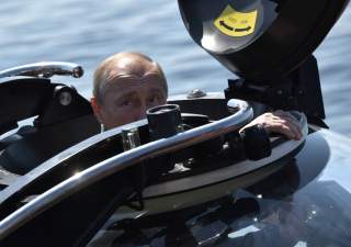Russian President Vladimir Putin is seen before the submerging on board C-Explorer 3.11 bathyscaphe to inspect the Sch-308 Semga submarine, which sank in 1942, near the isle of Gogland in the Gulf of Finland in the Baltic Sea, Russia July 27, 2019.