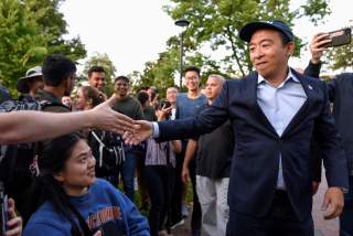 Democratic U.S. presidential candidate Andrew Yang greets supporters during a rally in Cambridge, Massachusetts, U.S. September 16, 2019. REUTERS/Faith Ninivaggi