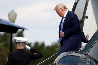 U.S. President Donald Trump walks out from Marine One helicopter as he arrives at Walter Reed National Military Medical Center in Bethesda, Maryland, U.S., October 4, 2019. REUTERS/Yuri Gripas