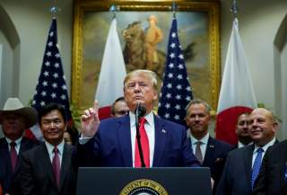U.S. President Donald Trump speaks about Turkey and Syria during a formal signing ceremony for the U.S.-Japan Trade Agreement at the White House in Washington, October 7, 2019. REUTERS/Kevin Lamarque