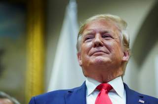 U.S. President Donald Trump participates in a formal signing ceremony for the U.S.-Japan Trade Agreement at the White House in Washington, October 7, 2019. REUTERS/Kevin Lamarque