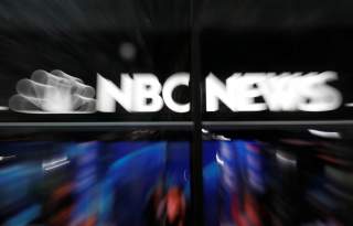 An NBC News sign and logo are seen outside the NBC News Today Show studios at Rockefeller Center in New York City, New York, U.S., October 9, 2019. Picture taken with zoom lens. REUTERS/Mike Segar