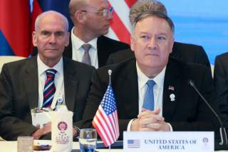 Former senior advisor Michael McKinley sits behind U.S. Secretary of State Mike Pompeo duirng a meeting with foreign ministers of Cambodia, Laos, Thailand, and Vietnam during the ASEAN Foreign Ministers' Meeting in Bangkok, Thailand August 1, 2019.