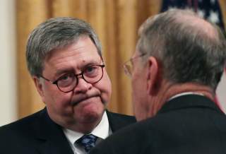 U.S. Attorney General William Barr speaks with Senator Chuck Grassley (R-IA) at an event hosted by U.S. President Donald Trump to celebrate federal judicial confirmations in the East Room of the White House in Washington, U.S., November 6, 2019.
