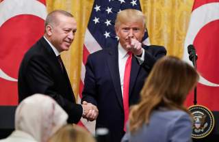 U.S. President Donald Trump greets Turkey's President Tayyip Erdogan after a joint news conference at the White House in Washington, U.S., November 13, 2019. REUTERS/Joshua Roberts