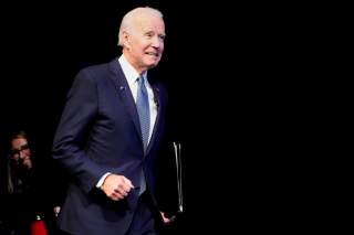 U.S. Democratic presidential candidate and former Vice President Joe Biden runs on stage at a First in the West Event at the Bellagio Hotel in Las Vegas, Nevada, U.S., November 17, 2019. REUTERS/Carlo Allegri