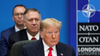 U.S. President Donald Trump, U.S. Secretary of State Mike Pompeo and Acting White House Chief of Staff Mick Mulvaney attend a North Atlantic Treaty Organization Plenary Session at the NATO summit in Watford, near London, Britain, December 4, 2019.