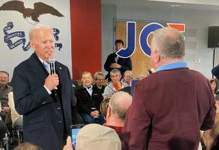 Democratic 2020 U.S. presidential candidate and former U.S. Vice President Joe Biden faces off with a local resident challenging him about his son Hunter Biden's involvement with Ukraine in this screen grab made from video shot during a Biden campaign eve
