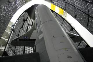 The X-37B Orbital Test Vehicle waits in the encapsulation cell of the Evolved Expendable Launch vehicle at the Astrotech facility in Titusville, Florida in this April,2010 handout photo provided by the U.S. Air Force. The X-37B is the U.S.'s newest and mo