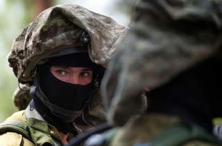 An Israeli special forces member looks on during a visit by U.S. Defense Secretary Chuck Hagel (not pictured) to a military K-9 unit training site at an army base near Tel Aviv April 23, 2013. REUTERS/Jim Watson/Pool