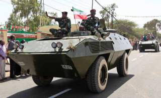 Somaliland troops sit on an armoured personnel carrier during a parade to mark the 22nd anniversary of Somaliland's self-declared independence from the larger Somalia, in Hargeisa May 18, 2013. REUTERS/Feisal Omar (SOMALIA - Tags: ANNIVERSARY POLITICS SOC