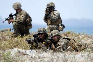 U.S. military forces take up positions during the annual 