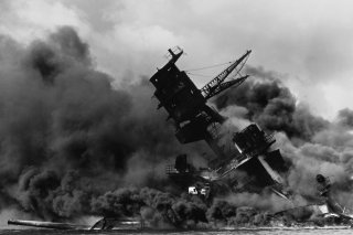 The USS Arizona (BB-39) burning after the Japanese attack on Pearl Harbor, 7 December 1941. Franklin D. Roosevelt Library.