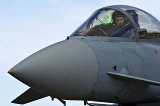 A German air force pilot conducts preflight checks from the cockpit of a GAF Eurofighter Typhoon before a combat training mission during Red Flag-Alaska 12-2 on Eielson Air Force Base, Alaska, June 11, 2012. U.S. Air Force photo by Tech. Sgt. Michael R. H