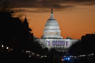 The sun rises over the U.S. Capitol before the public swearing-in ceremony during the 57th Presidential Inauguration in Washington, D.C, Jan. 21, 2013.