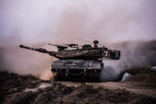 Battalion 74 tanks roll across beautiful Israeli landscapes.