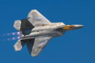 A Lockheed Martin F-22A Raptor fighter streaks by at the 2008 Joint Services Open House (JSOH) airshow at Andrews AFB. Despite many great performances most of those at the show wanted to see the latest USAF fighter. The F-22 did not disappoint!