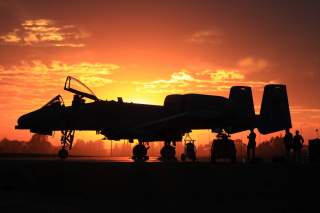 Airmen from the Maryland National Guard's 175th Wing load weapons on an A-10C at sunset. (Photo courtesy of the 175th Wing)