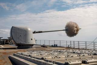 ADRIATIC SEA (June 6, 2018) The guided-missile cruiser USS Normandy (CG 60) fires its Mark 45 5-inch gun during a live-fire exercise. Normandy is deployed as part of the Harry S. Truman Carrier Strike Group