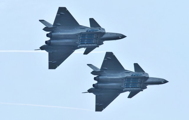 America's F-22 Raptor vs. China's J-20 Stealth Fighter: Which Is Better ...