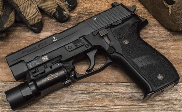 Sig Sauer vs. Glock: Why the Navy SEALs Dumped the P226 for the Glock ...