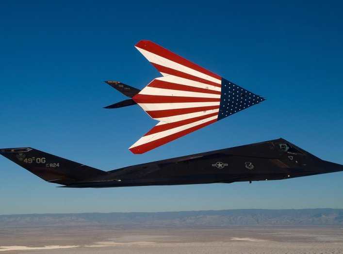 Two specially painted F-117 Nighthawks fly on one of their last missions. The F-117s were retired in a farewell ceremony at Wright-Patterson Air Force Base, Ohio, April 22, 2008. (U.S. Air Force photo by Senior Master Sgt. Kim Frey)