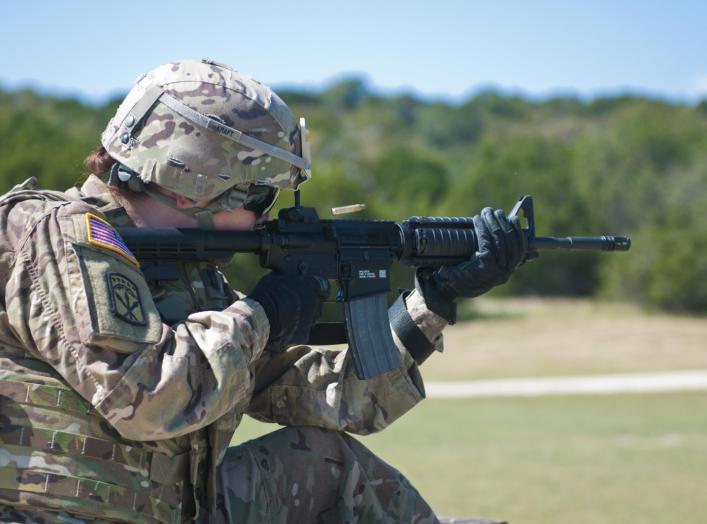 Fort Hood - 1st Lt. Elizabeth Kraft, an Army Reserve Soldier with the 316th Sustainment Command (Expeditionary), based out of Coraopolis, Pa., shoots her M4 carbine at popup targets during qualification at Fort Hood, Tx., Oct. 9, 2016.