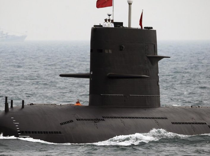 A Chinese Navy submarine takes part in an international fleet review to celebrate the 60th anniversary of the founding of the People's Liberation Army Navy in Qingdao, Shandong province April 23, 2009. REUTERS/Guang Niu/Pool